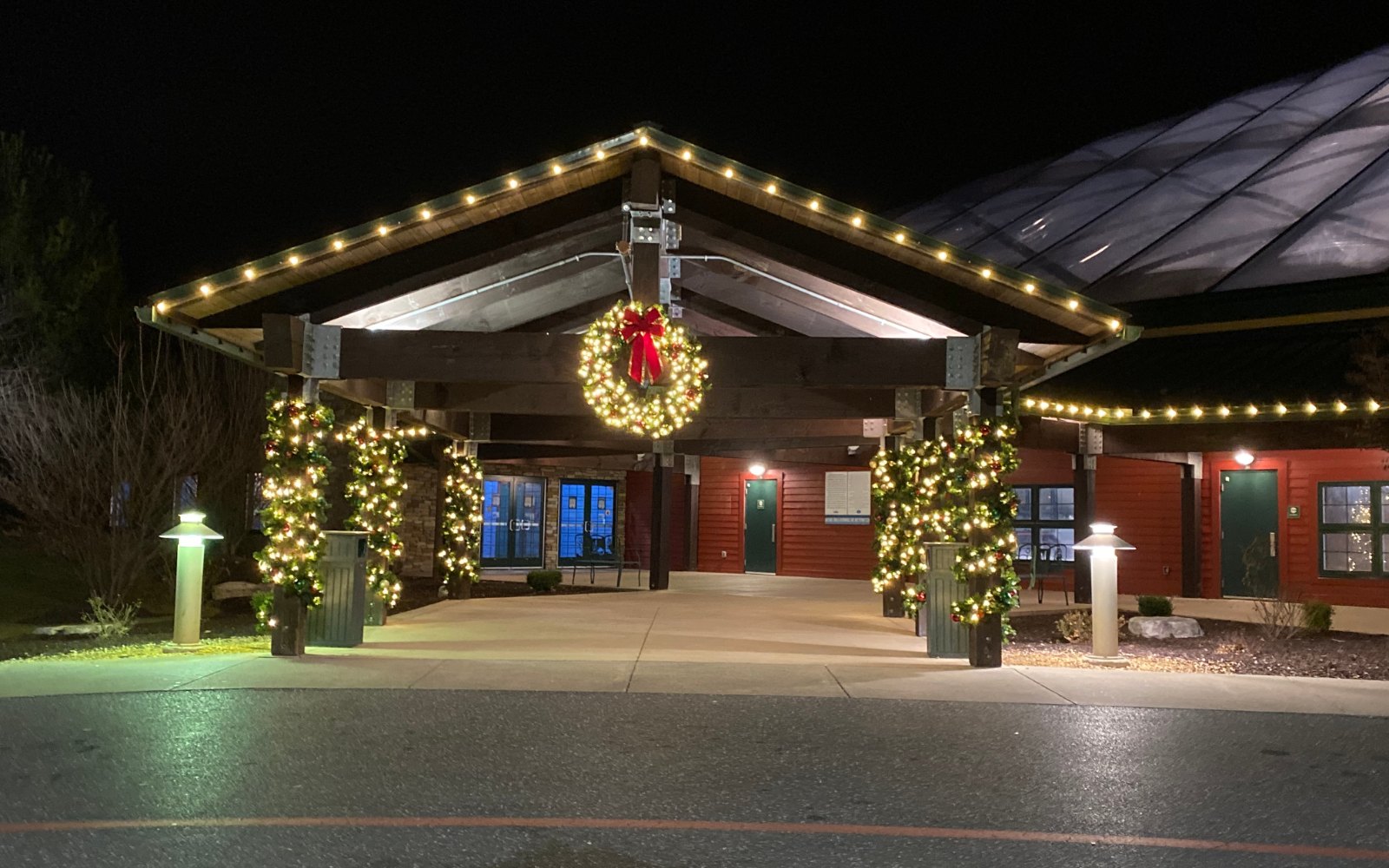 Architectural lighting on a commercial building facade at night